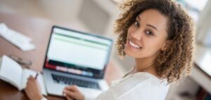 Preview image: Student researches on the Internet for her housework